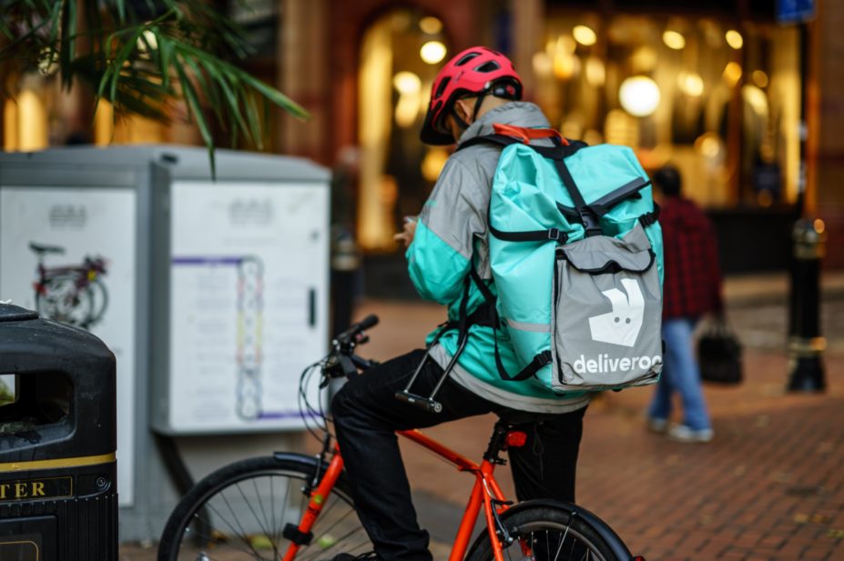 Deliveroo courier on bicycle