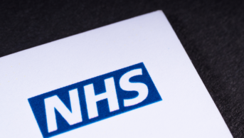 NHS logo on paper