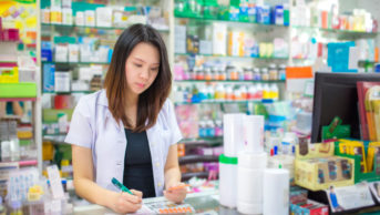 Asian pharmacist working