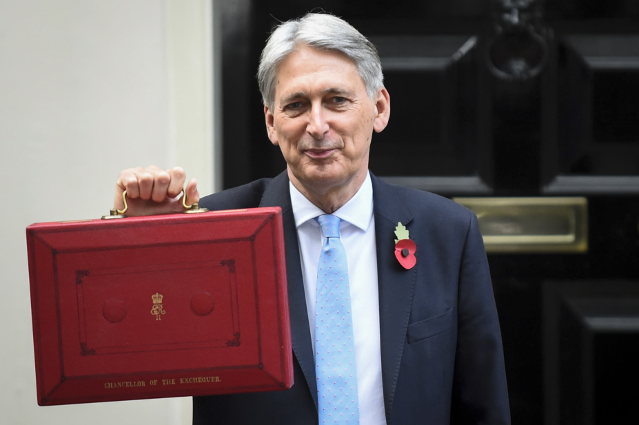 Phillip Hammond showing the 2018 Budget briefcase