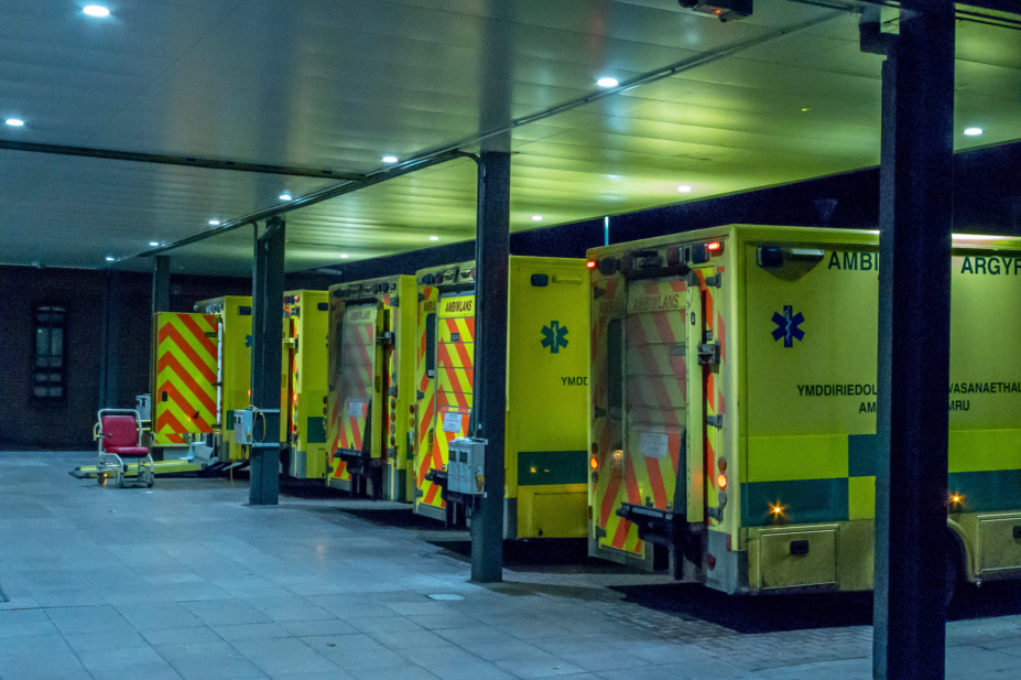 Ambulances queue outside of a hospital