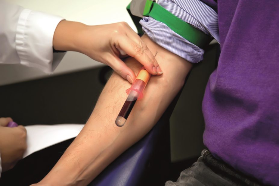 Man taking a blood test