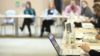 The Royal Pharmaceutical Society (RPS) will no longer reserve seats on its English board for particular sectors of the profession in future elections, following approval from its governing body. In the image, a board meeting in session