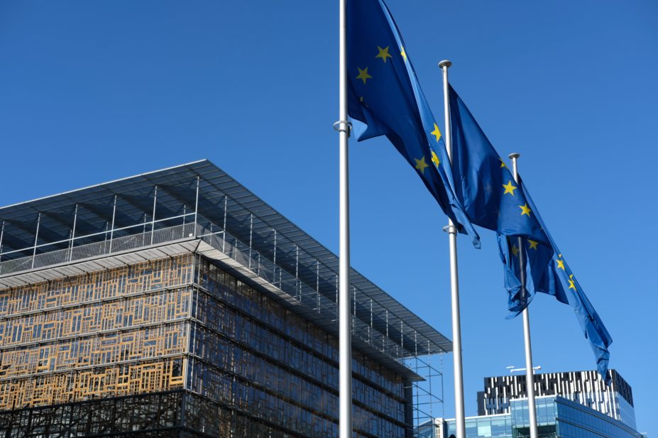 Council of the European Union Europa building with EU flags outside
