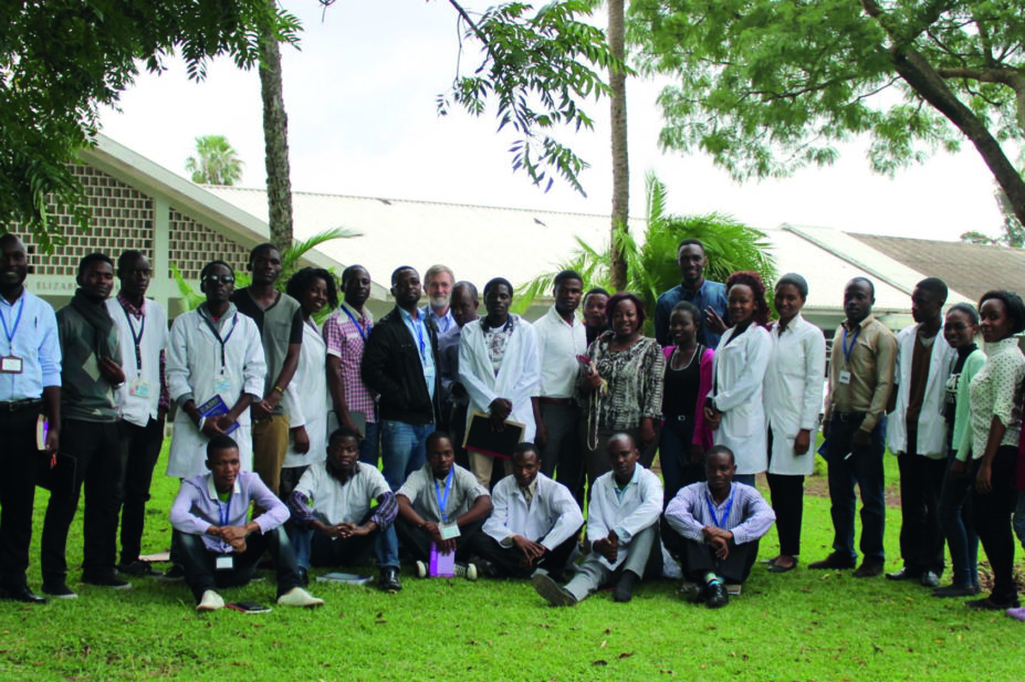 David Scott, lecturer in the pharmacy department of the University of Malawi, Africa, with students and pharmacists