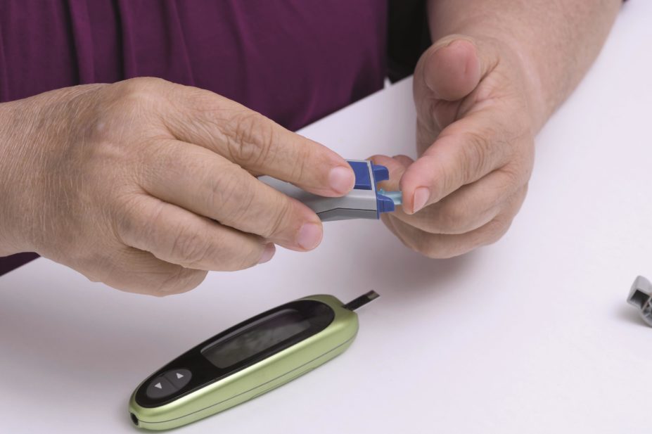 Diabetes patients who add dipeptidyl peptidase-4 (DPP-4) inhibitors to their metformin therapy have a lower risk of stroke and hypoglycaemia, researchers find. In the image, a woman with diabetes takes a sugar level blood test