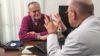 Fewer antibiotic prescriptions are issued for acute respiratory infections when doctors make decisions jointly with patients, according to a review of clinical trials. In the image, a doctor speaks with a patient
