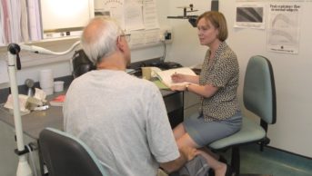 The NHS Health Check has helped identify patients with undiagnosed hypertension, type 2 diabetes and chronic kidney disease, since it was introduced in April 2009. In the image, a patient consults with a doctor