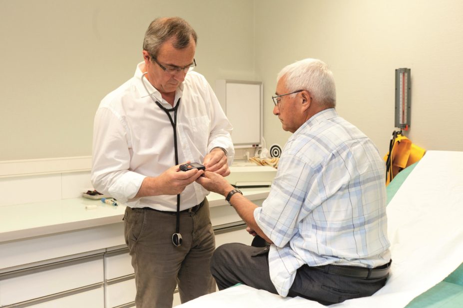 Healthcare professionals are being advised to take an individualised approach when treating adults with type 2 diabetes, according guidelines from NICE. In the image, a doctor does a diabetes test with a patient