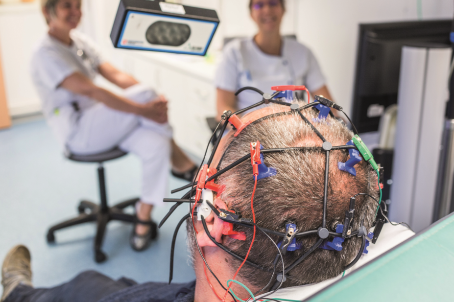 Person with epilepsy is monitored with an EEG
