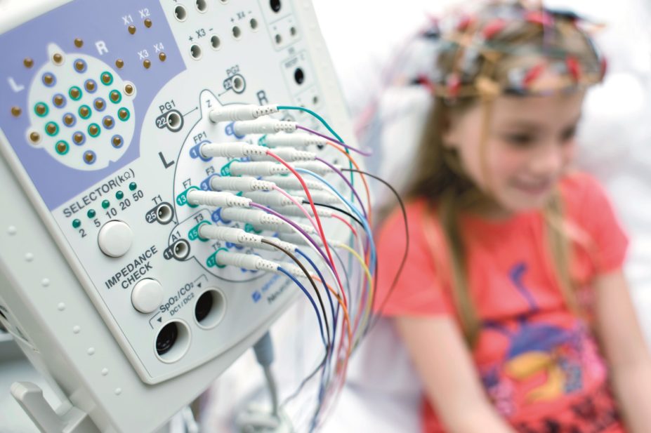 Close up of an electroencephalogram measuring a young girl's brain connectivity