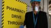 Pharmacist at drive through pharmacy at Northwick Park Hospital Harrow