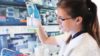 Developing a lasting research culture within pharmacy could drive improvements throughout the profession in Wales. In the image, a female scientist in a research laboratory
