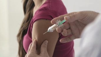 Young girl receives HPV vaccine