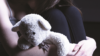Girl holding teddy bear, child abuse concept