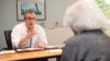 GPs who refuse to prescribe unnecessary antibiotics to patients are likely to receive poorer patient satisfaction scores, a study shows. In the image, a GP speaks to a patient