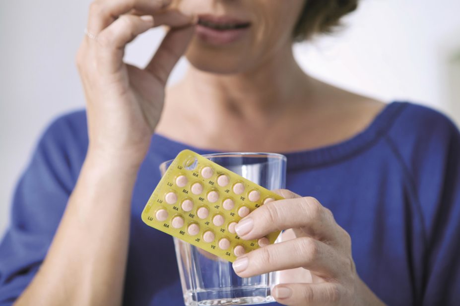 Hormone replacement therapy (HRT) should be considered to treat menopausal symptoms and healthcare professionals should be more willing to discuss this option with patients. In the image, a woman takes HRT