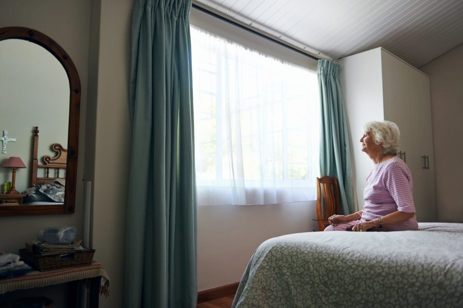 Isolated older woman at home
