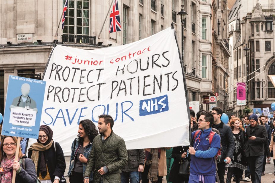 Junior doctor representatives and the government are returning to the Advisory, Conciliation and Arbitration Service (ACAS) in an attempt to avert industrial action. In the image, junior doctors protest against protest in London against contract changes