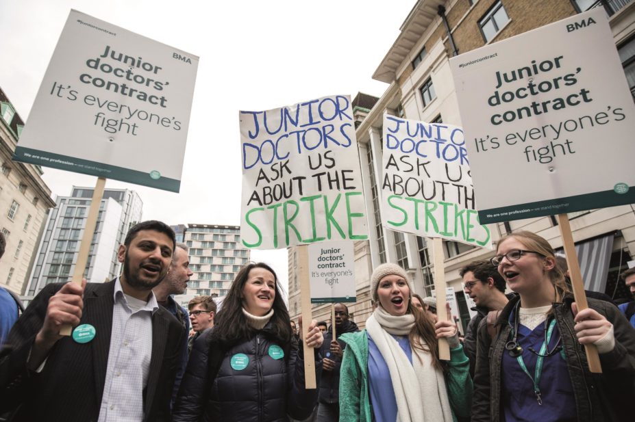 Hospital pharmacists have expressed support for the 24-hour strike being held by junior doctors in England over their new contract. In the image, junior doctors on the picket line outside St Thomas’ Hospital in London