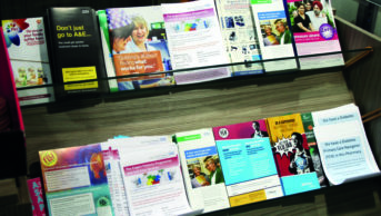 Leaflets offering pharmacy services in a pharmacy