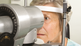 older person being tested for macular degeneration
