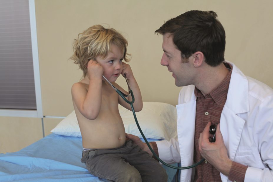 Medicines information contained in a third of hospital discharge letters for paediatric patients contained “discrepancies” that were picked up by a pharmacist, according to research. Pictured, a doctor treating a young boy.