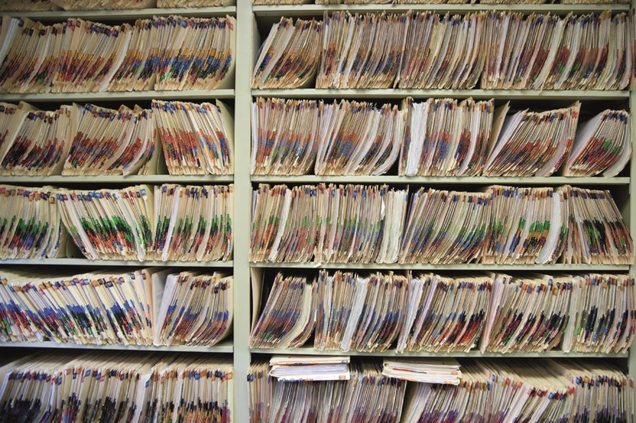 Medical records on a shelf