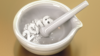 Pharmacy mortar and pestle with powdered 2016