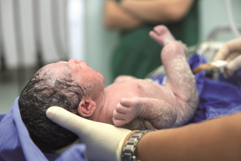Asfotase alfa, a novel treatment for a rare childhood bone disorder known as paediatric-onset hypophosphatasia has been provisionally rejected for NHS funding by NICE, which costs £366,912 per person per year. In the image, a new-born baby