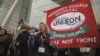 NHS staff take part in four-hour walk out strike over pay dispute
