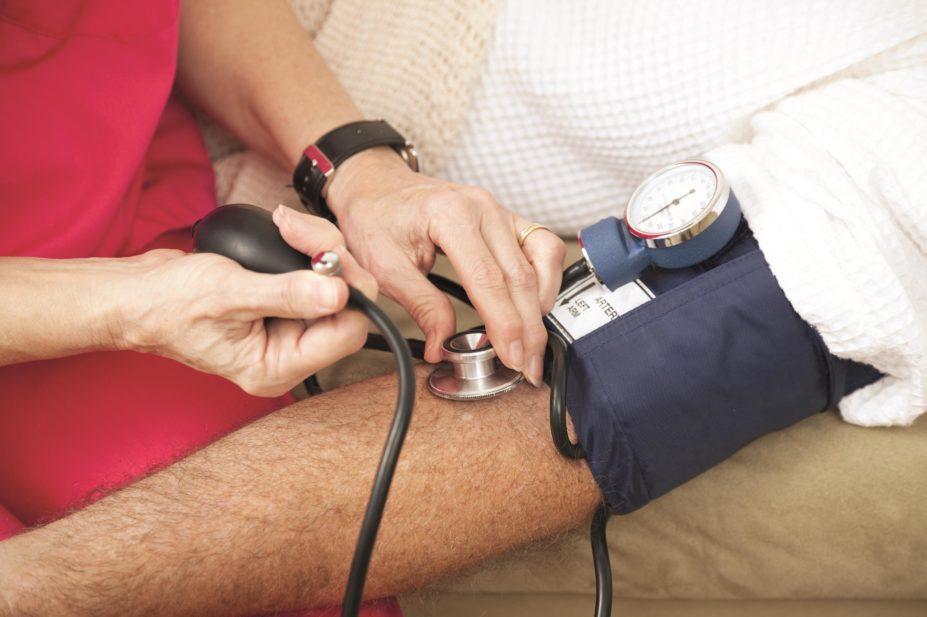 Patients taking blood pressure therapie are at a greater risk of developing diabetes if they take their drugs when they wake up, compared with if they take them as they settle down to sleep. In the image, nurse takes a patient's blood pressure