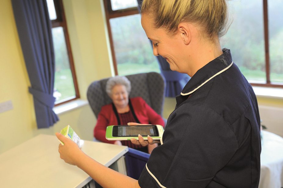 A barcoding system for dispensing medicines in 30 care homes in Wales is saving staff time, improving patient safety and reducing medicines waste. In the image, a nurse from Bethany Residential Home, Chepstow, scans a medicine pack with the new system