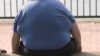Obese man sitting