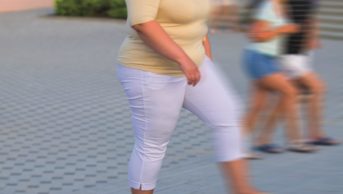 Glucagon-like peptide 1 (GLP-1) receptor agonists are used to treat type 2 diabetes mellitus and one such agent, liraglutide, has recently been approved for use as an anti-obesity drug. In the image, an obese woman walks on the pavement