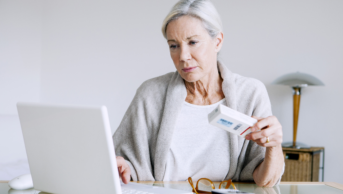 Older woman buying medicines online