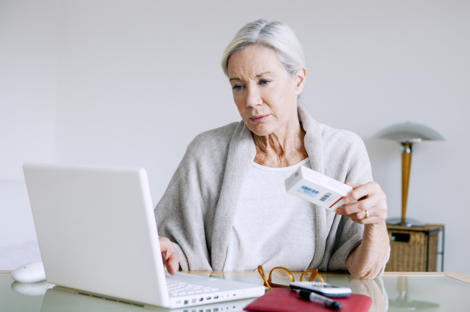 Older woman buying medicines online