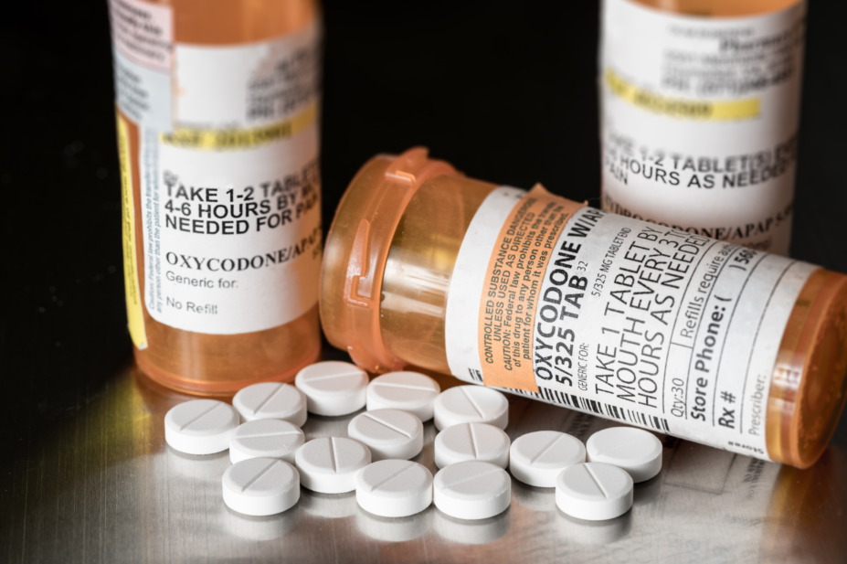 Oxycodone, a prescription opioid often diverted for misuse, in bottles