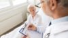 A third of hospital trusts admit that they fail to pass on information about new medicines to GPs or carers when patients are discharged, according to an inquiry. In the image, an elderly patient is being discharged from hospital by a doctor