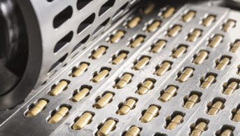 Pills being produced on a medicine production line