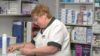 Community pharmacists should be given read and write access to the health records of palliative care patients to reduce delays in receiving medicines, says the Royal Pharmaceutical Society (RPS) Scotland. In the image, pharmacist prepares a prescription