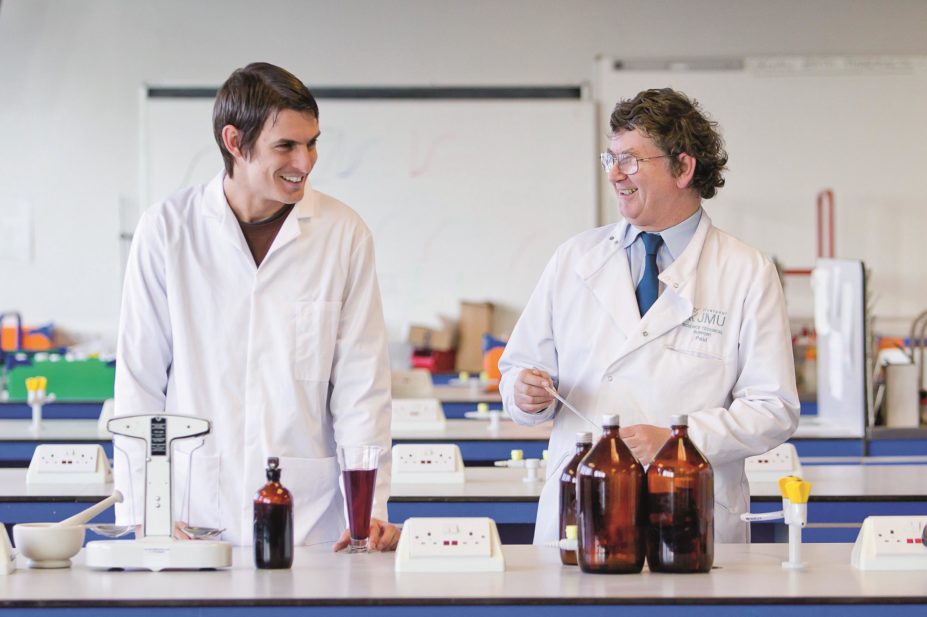 Newly qualified pharmacists can now apply to the first RPS-endorsed “foundation schools”. Liverpool John Moores School of Pharmacy and Biomolecular Sciences is one of them. In the image, a pharmacy student with his lecturer from Liverpool John Moores