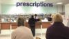Patients waiting to be seen in a pharmacy