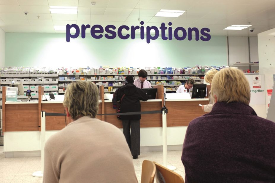 Patients waiting to be seen in a pharmacy