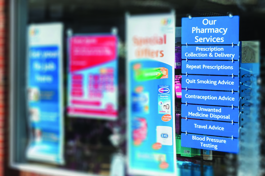 Storefront showing pharmacy services