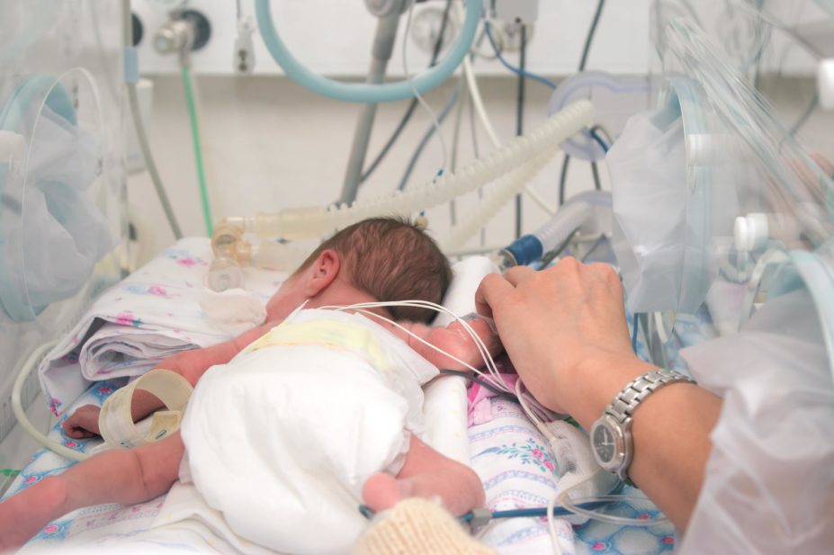 A small-molecule allosteric modulator of IL-1, termed rytvela or 101.10 was effective at delaying inflammation-induced preterm birth in mice. In the image, a doctor holds the hand of a pre-term baby in an incubator