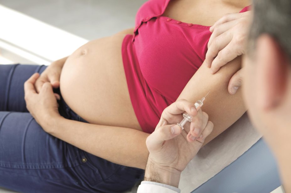 Public Health England (PHE) is encouraging pregnant women to get immunised against whooping cough, an acute respiratory infection, to protect themselves and their babies. In the image, pregnant woman is vaccinated