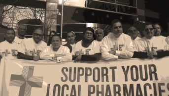NPA and PSNC members protest in front of the Department of Health in London against the community pharmacy cuts