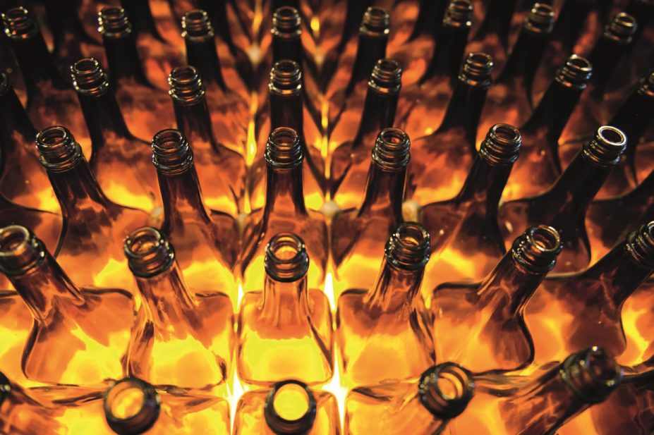 The EU has shown a lack of leadership in tackling alcohol-related harm and its citizens are paying the price. In the image, rows of empty bottles against a yellow background