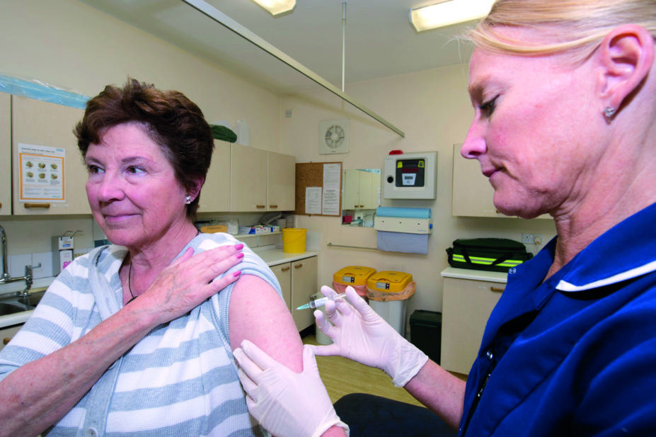 Senior woman receives shingles vaccine